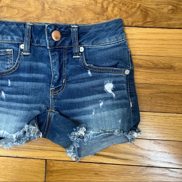 American Eagle distressed ripped cutoff super stretch midi jean shorts 00 - Picture 3 of 7
